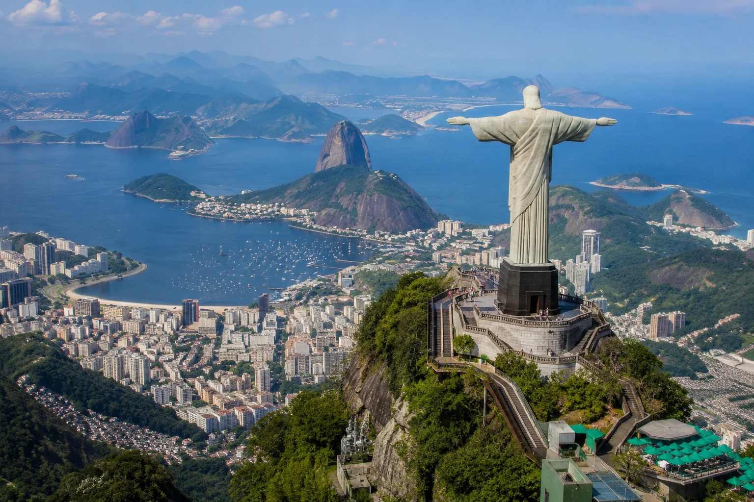 Christ the Redeemer overlooking Rio de Janeiro and Sugarloaf Mountain, Brazil